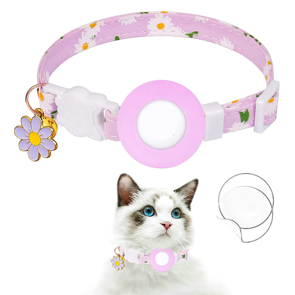Pink Daisy Air Tag cat collar with white daisy pattern and secure Air Tag holder on a soft pink band