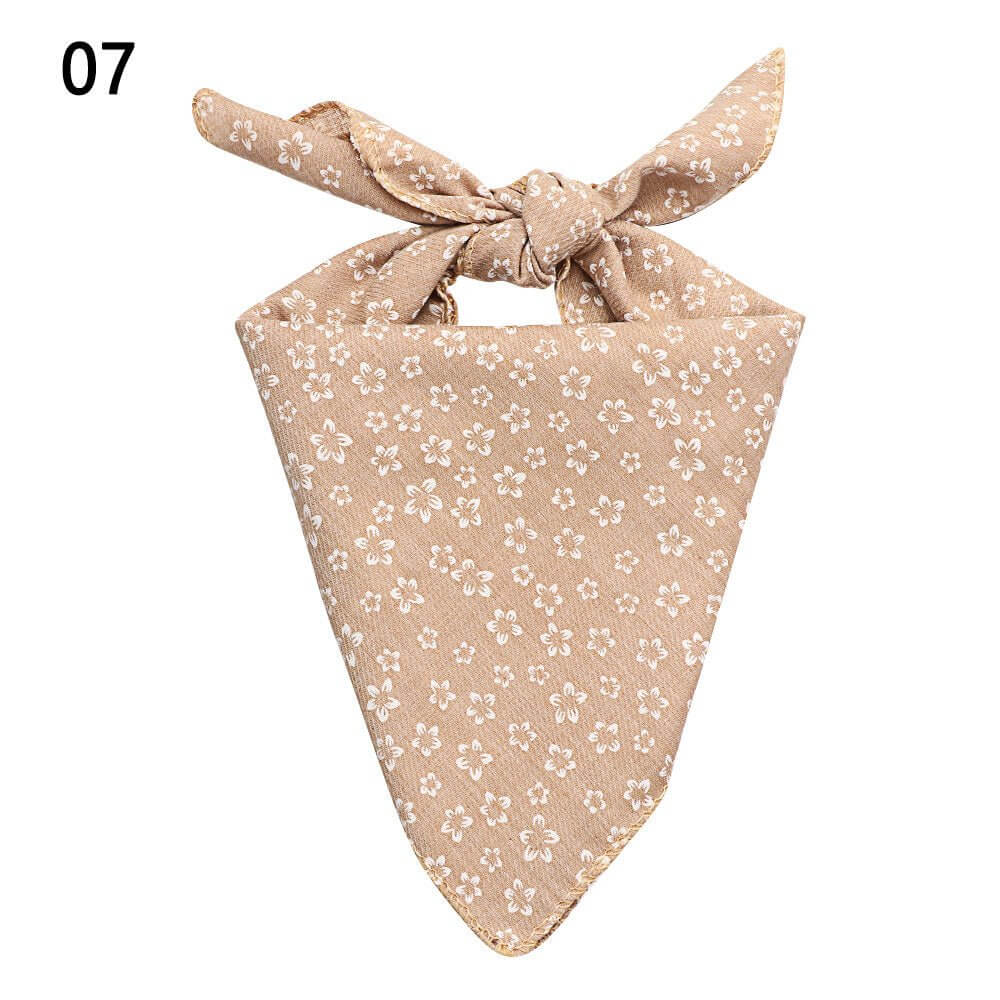 Pink Floral Pet Bandanna made of quality materials, featuring stylish floral patterns perfect for pets.