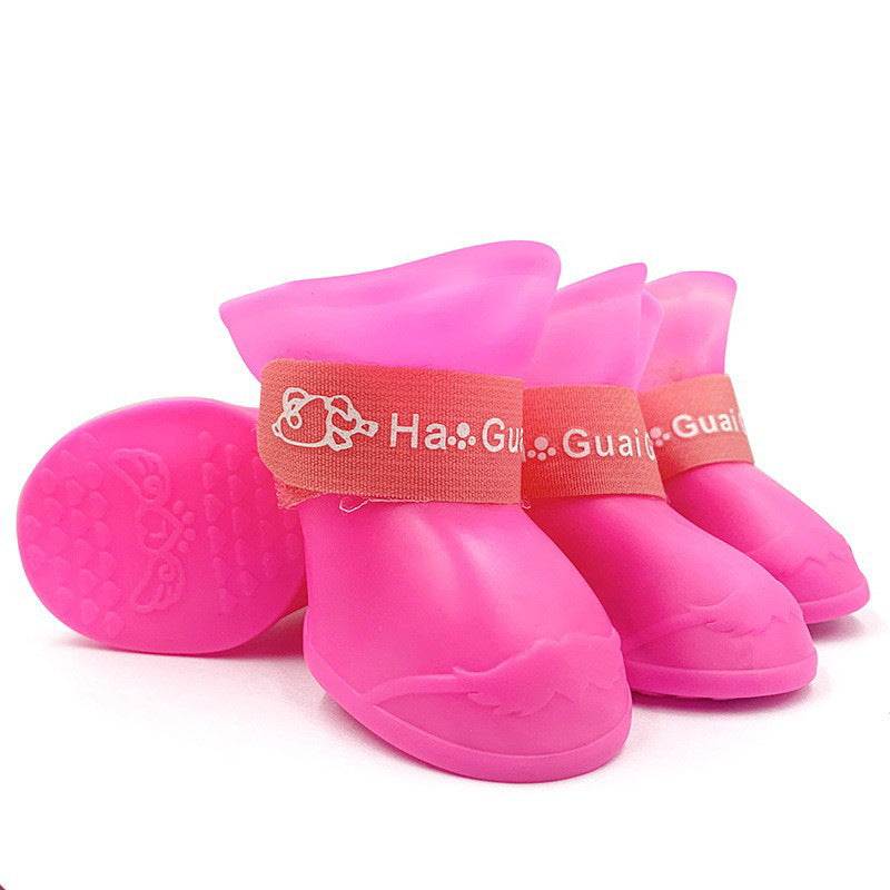 Pink Pet Rainboots for dogs from Pet Panache Boutique, waterproof pet boots with a cute pink design for rainy days.