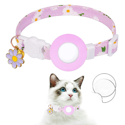 Pink Daisy Air Tag cat collar with white daisy pattern and secure Air Tag holder on a soft pink band