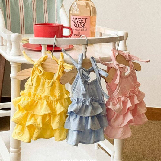 Pet Panache Boutique pet ruffled sundress featuring colorful floral fabric and a cute, frilly design for small dogs or cats.