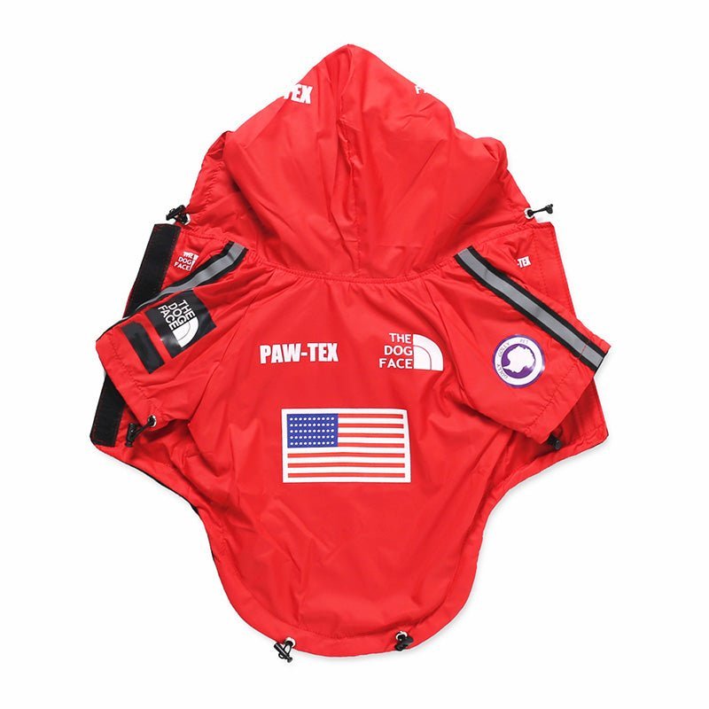 Pet Panache Boutique America flag pet raincoat draped on a small dog, featuring vibrant red, white, and blue stars and stripes.