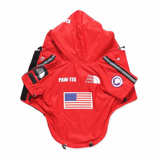 Pet Panache Boutique America flag pet raincoat draped on a small dog, featuring vibrant red, white, and blue stars and stripes.