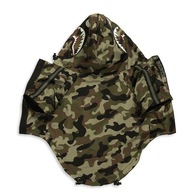 Camouflage Pet Raincoat by Pet Panache Boutique showing a dog wearing a green and brown camouflage waterproof coat.