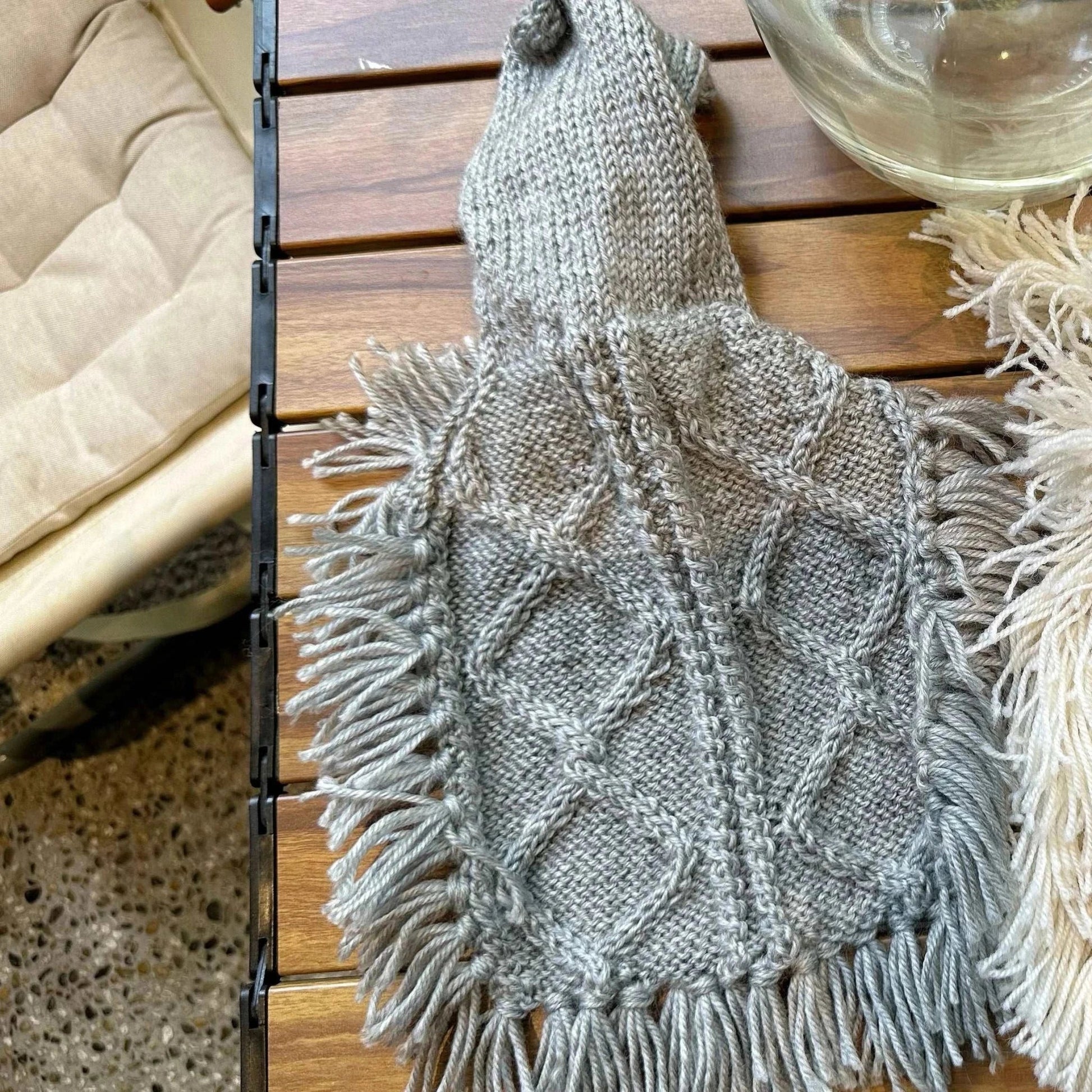 Pet Panache Boutique fringed knit pet sweater with hoodie, stylish pet poncho with fringed detailing and cozy design.