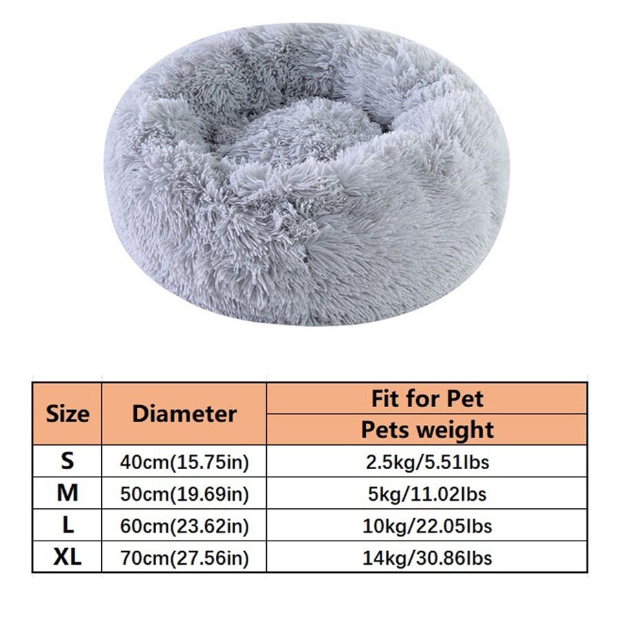 Gray plush round pet bed from Pet Panache Boutique with soft, cushioned interior for cozy pet comfort.