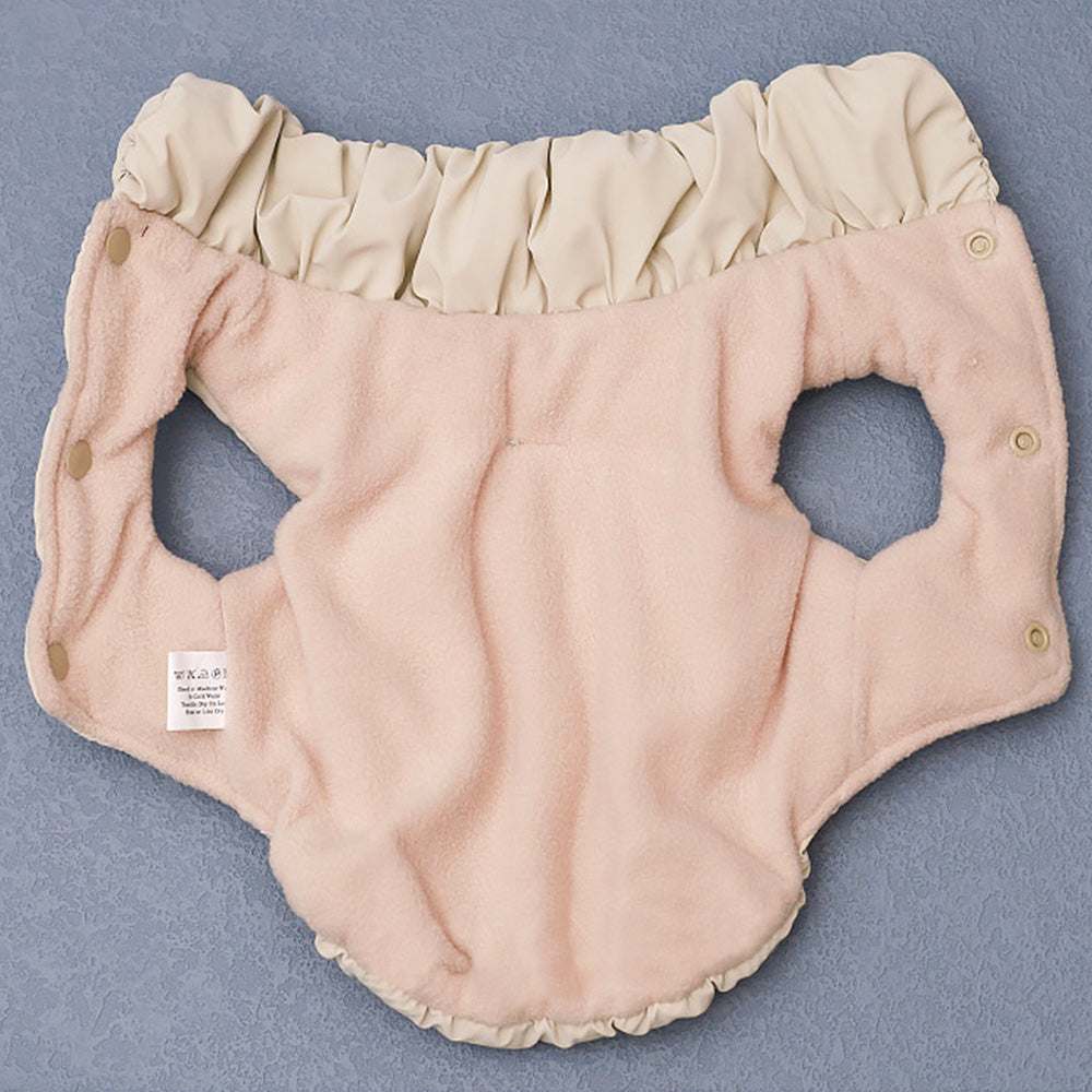 Light blue, pink, and beige pet vest by Pet Panache Boutique, showcasing a comfortable and stylish pet clothing option.