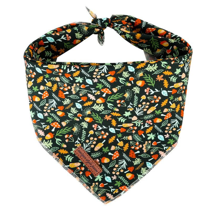 Mushroom Melody Pet Bandanna with colorful mushroom and foliage pattern on black fabric, stylish and comfortable fit for pets