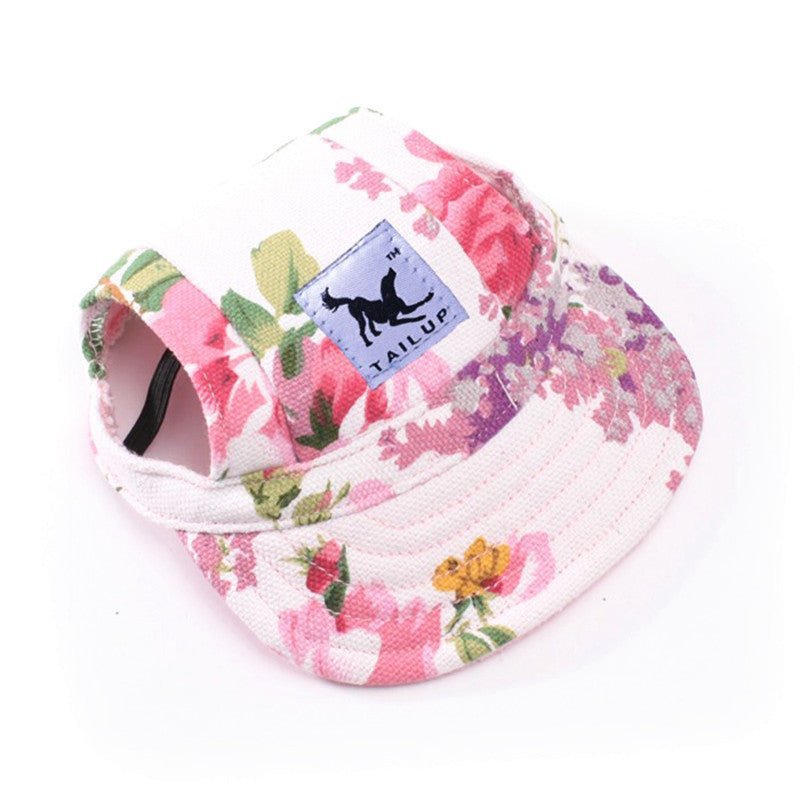 Pink floral pet hat from Pet Panache Boutique with a charming design, perfect for stylish pets.