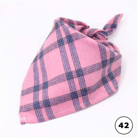 Pink plaid pet bandanna from Pet Panache Boutique featuring a stylish, cozy accessory for dogs and cats.