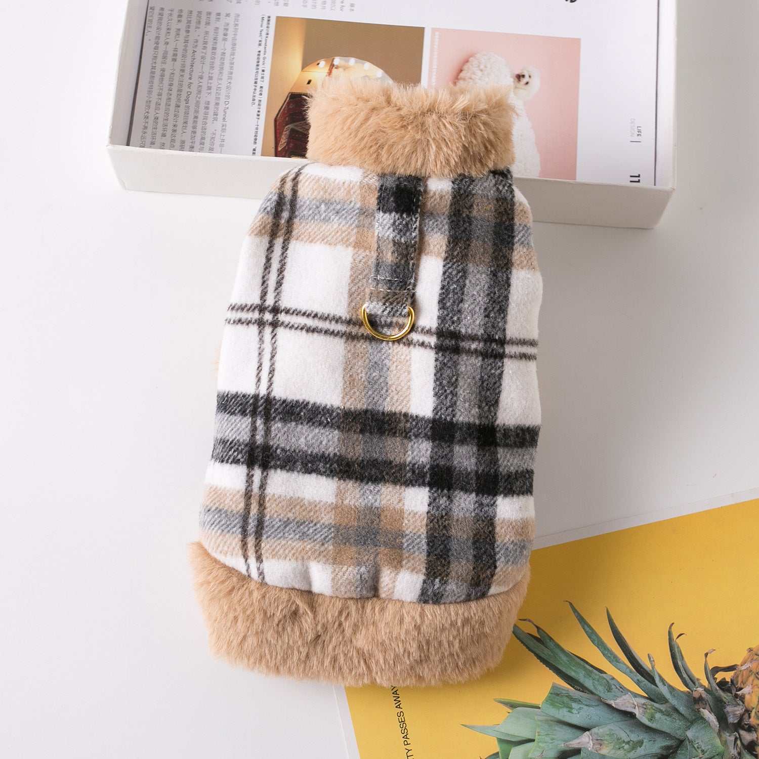 Plaid pet jackets with pink or brown trim from Pet Panache Boutique, stylish dog or cat outerwear with a cozy, fashionable design.