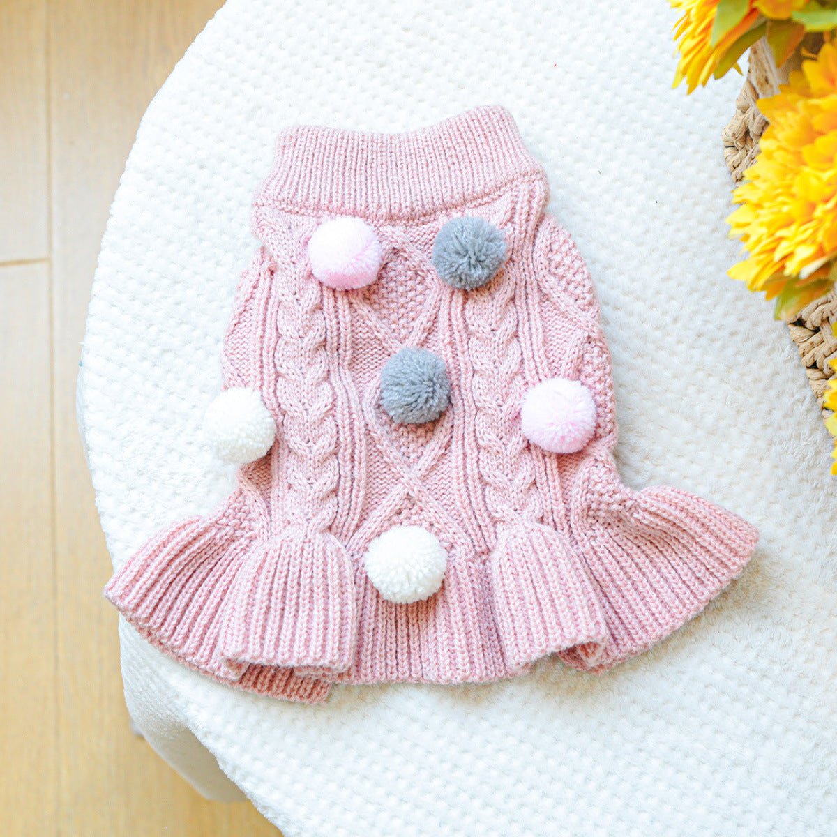 Pink Pompom Knit Sweater for pets by Pet Panache Boutique, showing a cozy pink pet sweater with pompom details.
