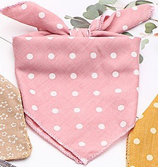 Pink Polka Dot Pet Bandanna with white polka dots, stylish pet wear made from quality materials.