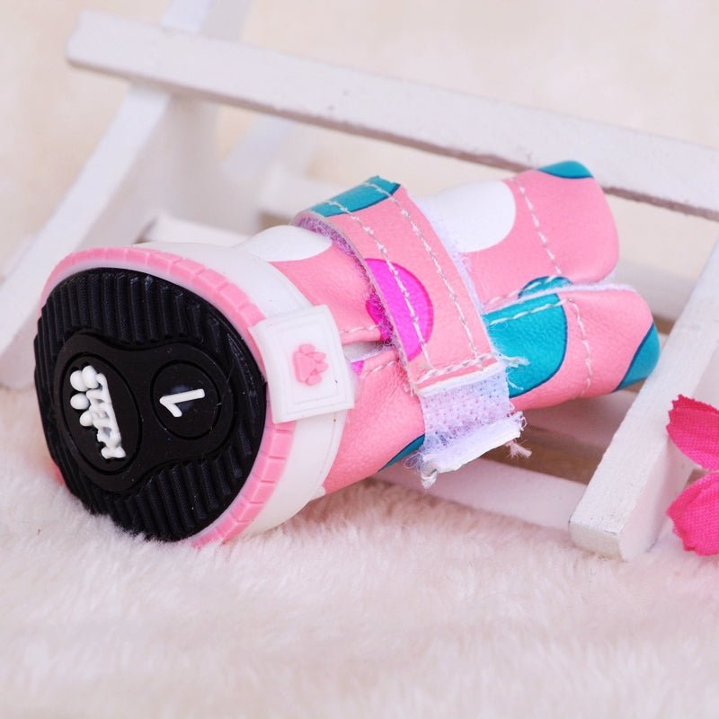 White Polka Dot Pet Boots from Pet Panache Boutique, featuring a cozy design and durable sole for small dogs or cats.