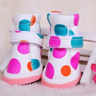 White polka dot pet boots from Pet Panache Boutique, showcasing comfortable footwear for small pets with stylish polka dot design.